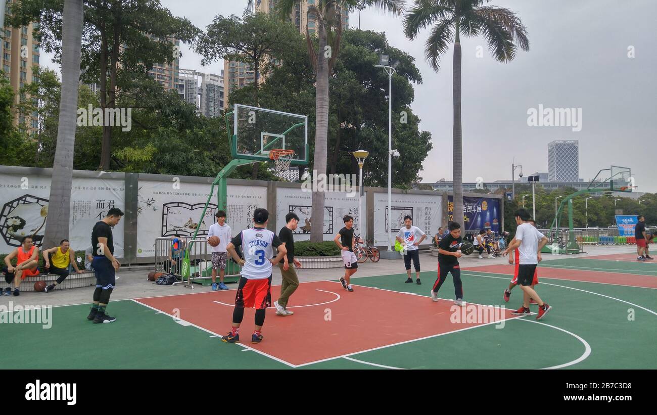 Shenzhen, China residents enjoy playing basketball at the reopening of