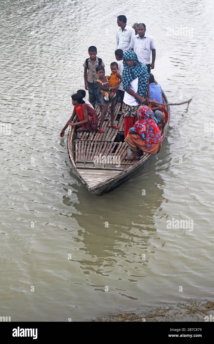 Bangladesh is one of the most vulnerable countries susceptible to climate change. Flooding is the key natural calamity here for the rural  poor people Stock Photo