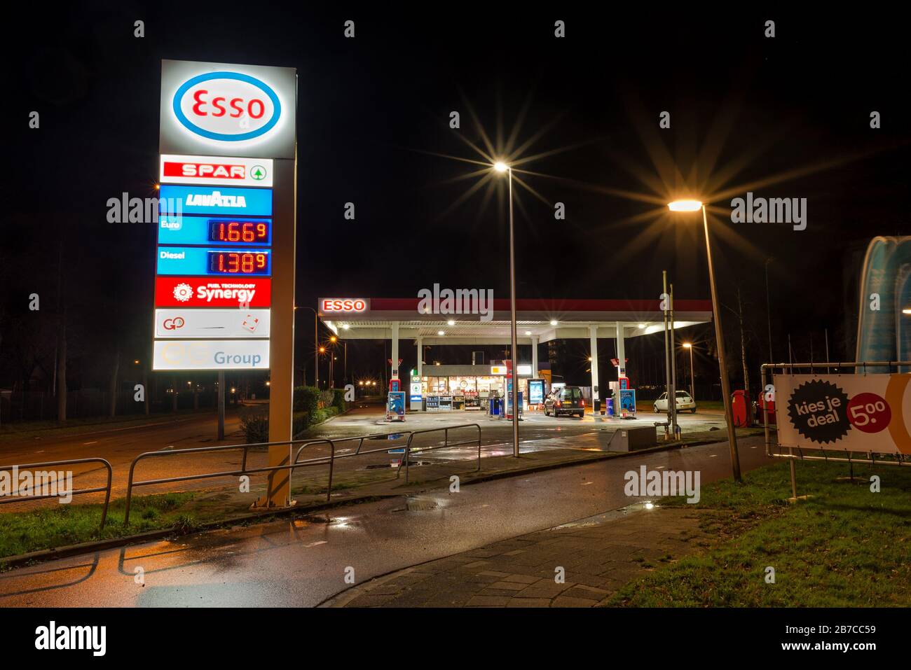 Esso (Exxon Mobile) gas station and store at night Stock Photo