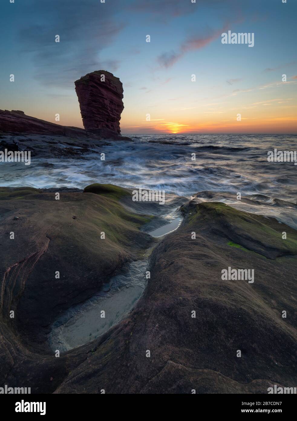 The Deil's Heid (Devils Head) sea stack, Seaton Cliffs, Arbroath, Angus, Stock Photo