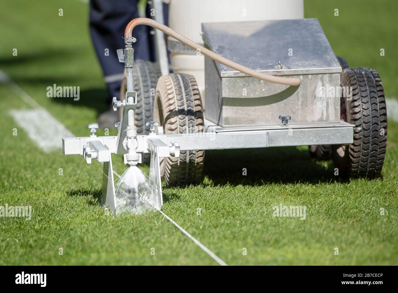 Painting line on a football pitch Stock Photo Alamy
