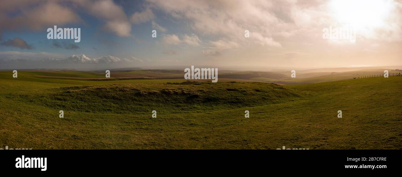 A Neolithic long barrow on Firle Beacon on the South Downs Way, East Sussex, UK Stock Photo
