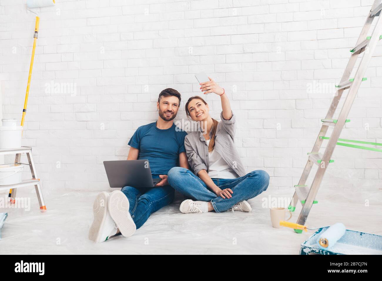 Young couple moving to a new house Stock Photo