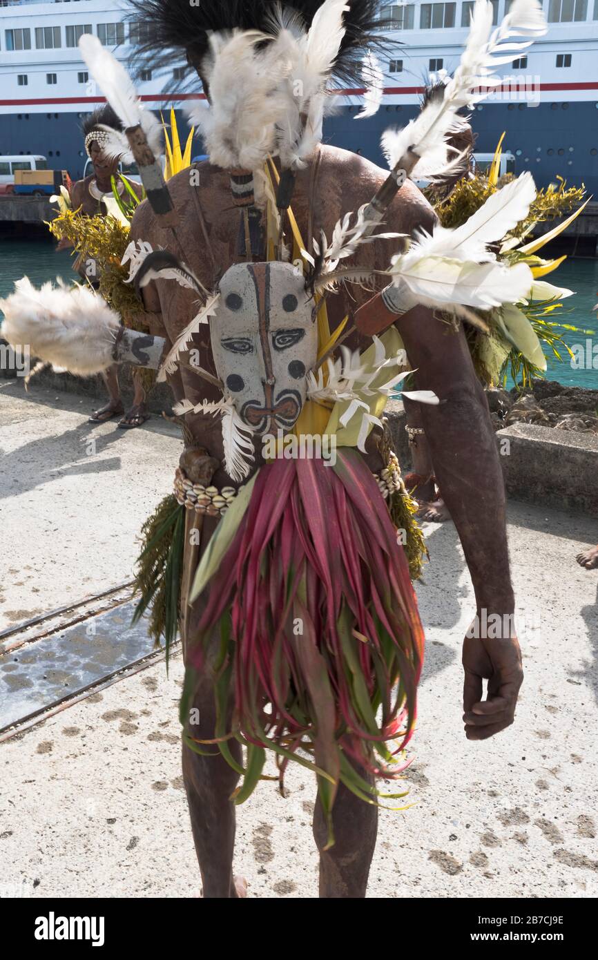 dh Port PNG native welcome WEWAK PAPUA NEW GUINEA Traditional feather tribal dress welcoming cruise ship visitors people touris Stock Photo
