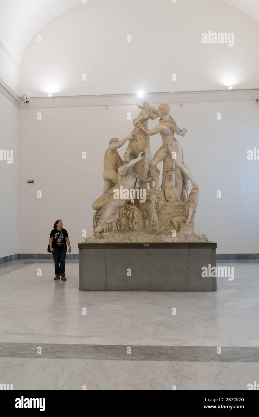 A marble statue of the Toro Farnese also known as the Farnese Bull at the Nation Archeological Museum of Naples in Italy Stock Photo