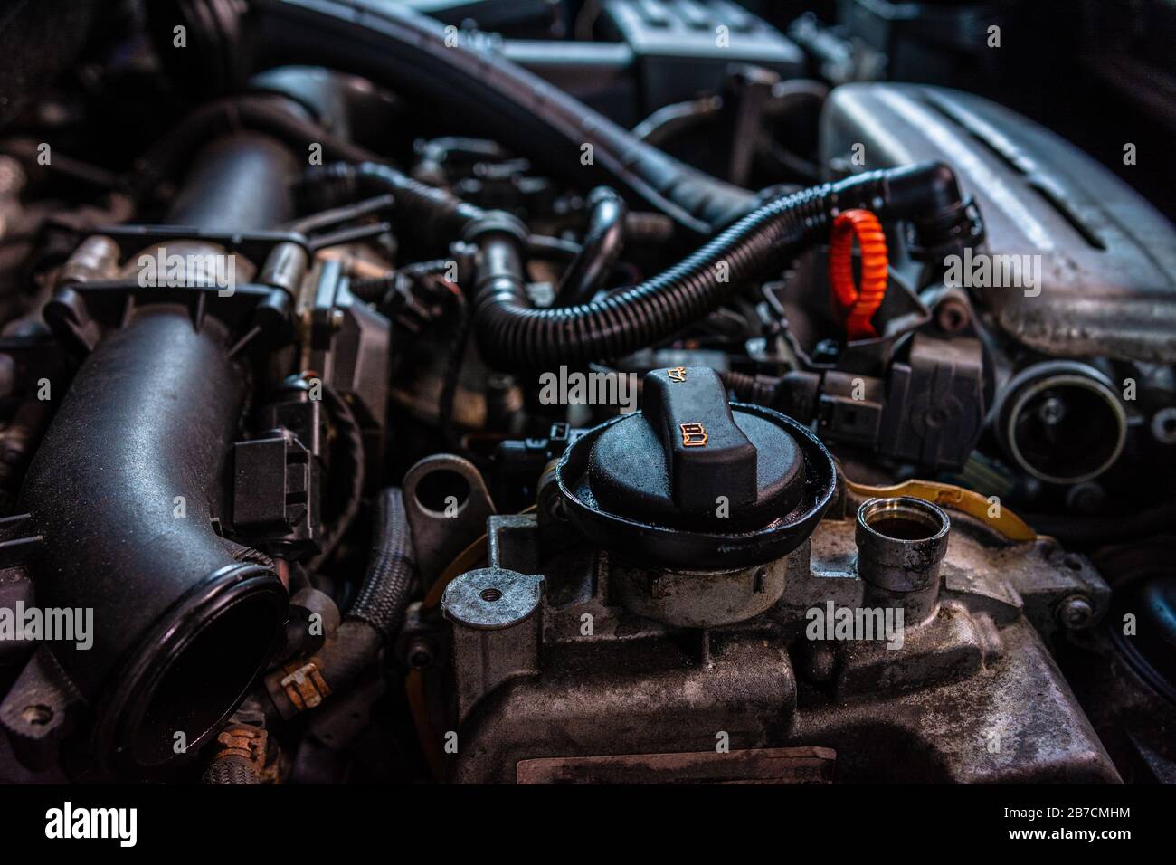 closeup of car turbo engine with oil filler neck for lubrication of internal parts and turbine 2020 Stock Photo