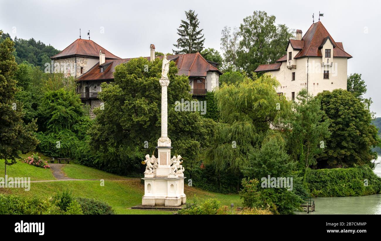 WERNSTEIN AM INN, GERMANY - JULY12, 2019:  View of the Medieval Burg Wernstein castle and Marian Column (Mariensaule). Stock Photo