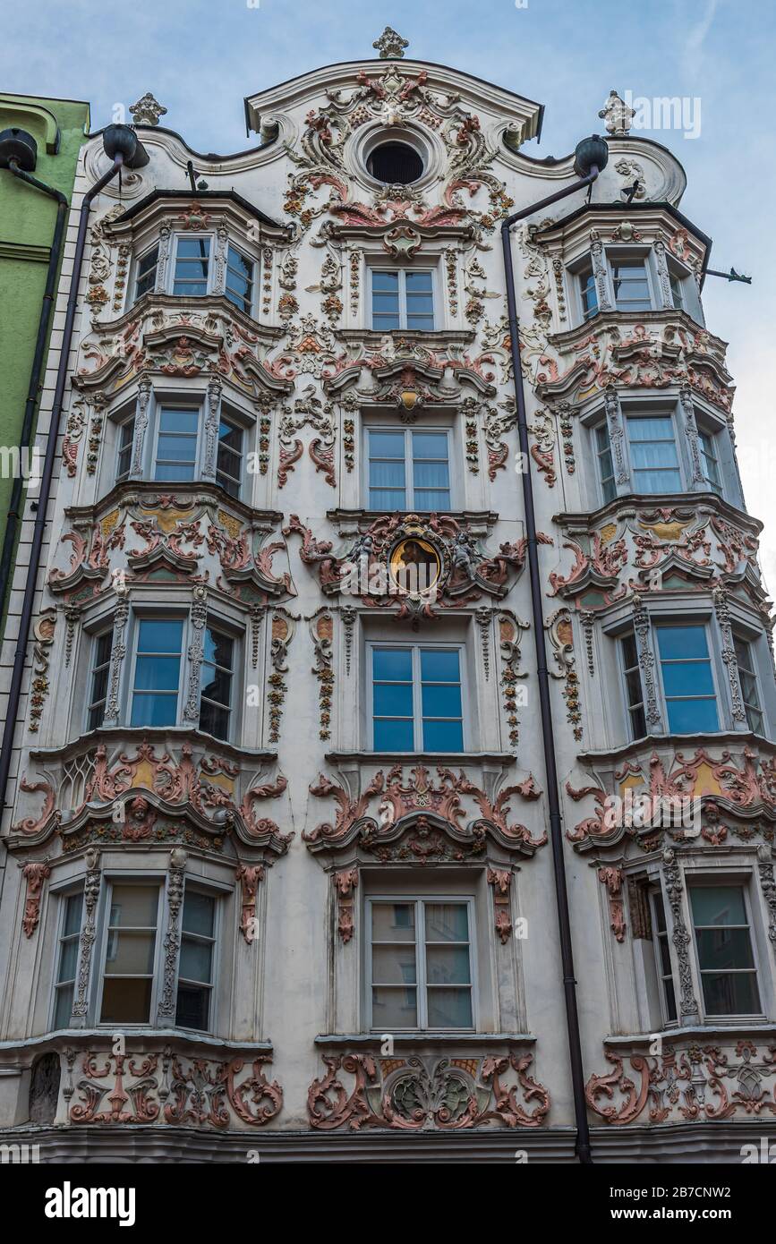 Facade of the Rococo decorated Helbling Haus in the old town of Innsbruck, facing the Goldenes Dachl Stock Photo