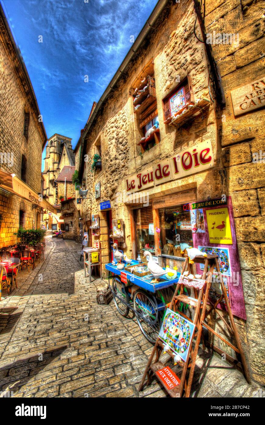Town of Sarlat-la-Caneda, France. Artistic rear view of a souvenir shop on Sarlat’s Pl de la Liberte. Stock Photo