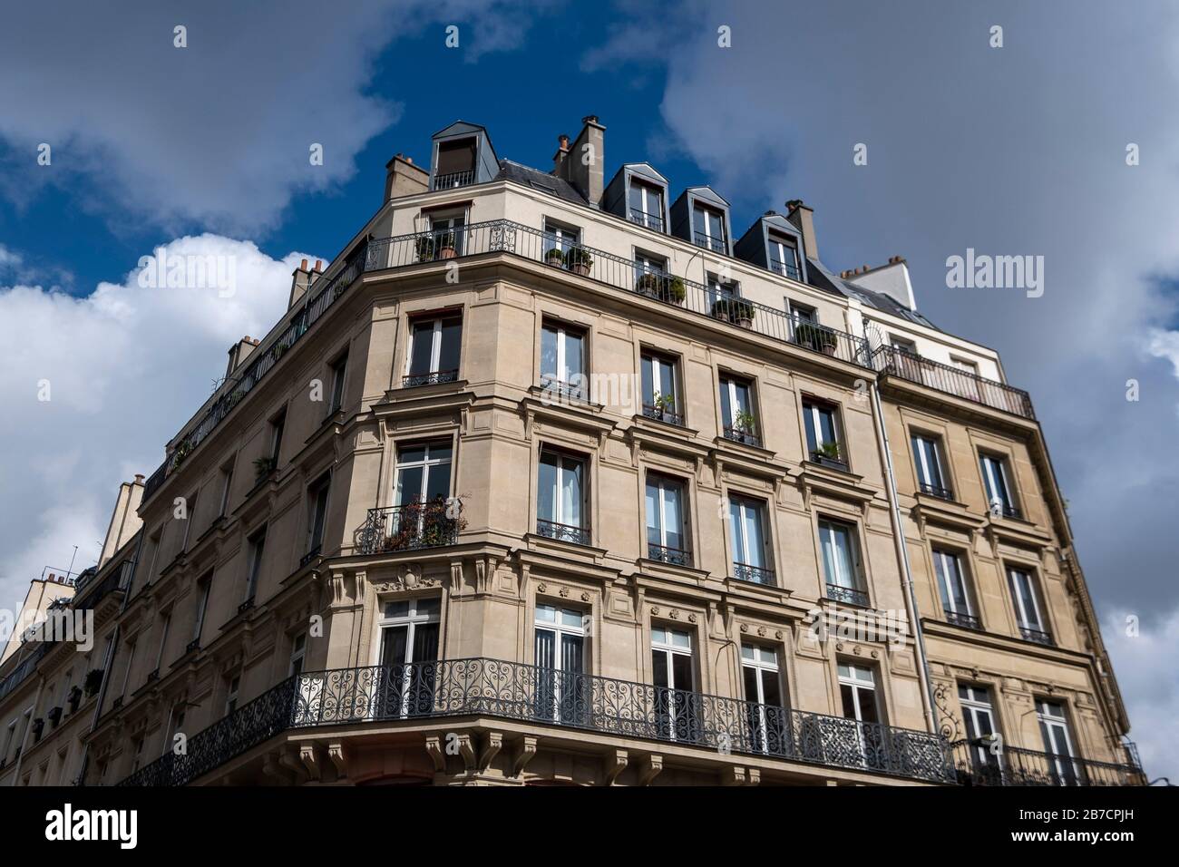 Traditional parisian style apartment building in Paris, France, Europe Stock Photo