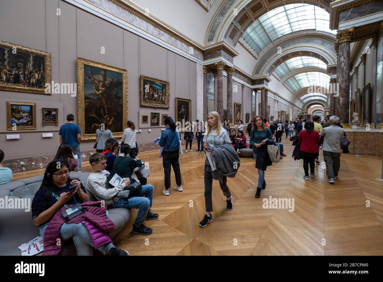 Tourists at the Louvre Museum in Paris, France, Europe Stock Photo
