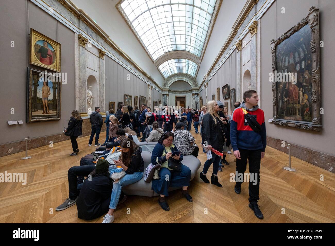 Tourists at the Louvre Museum in Paris, France, Europe Stock Photo