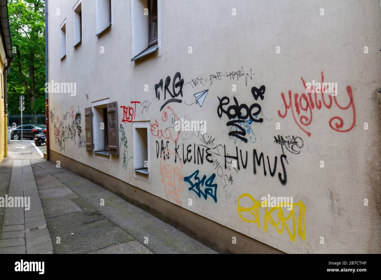 Ugly graffiti on a wall in Regensburg, Bavaria, Germany. Stock Photo