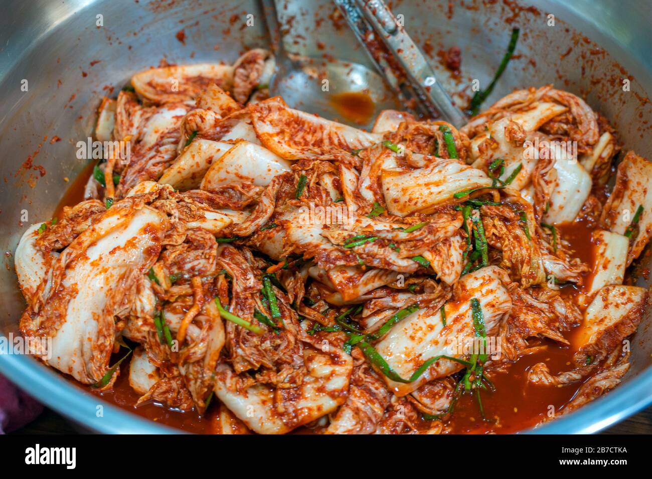 Bowl Fresh Korean Kimchi. Pickled Spicy Vegetable. Juicy Chilli Cabbage on Asian Restaurant.. Stock Photo