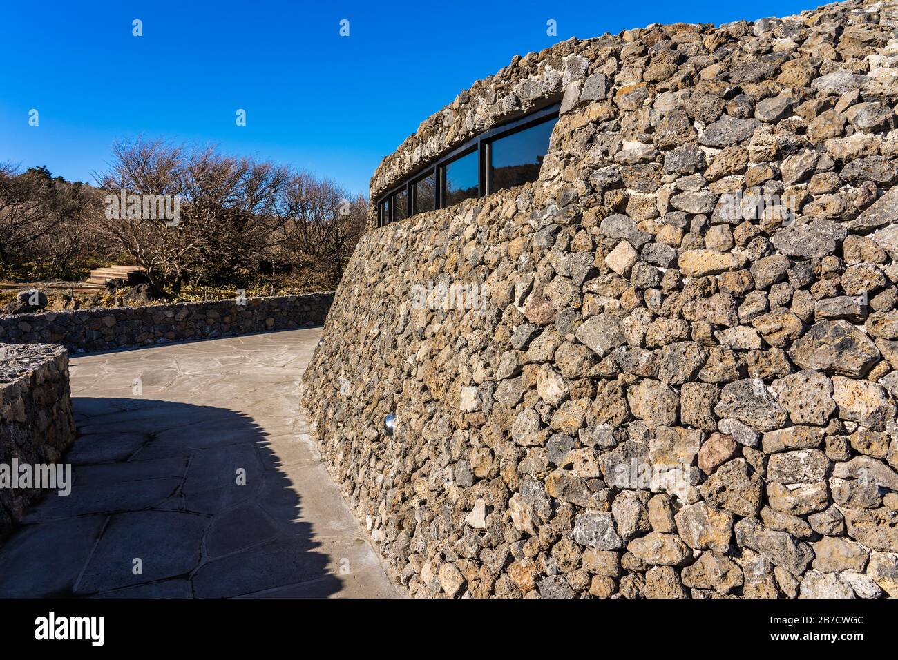 Curved natural stone wall hi-res stock photography and images - Alamy