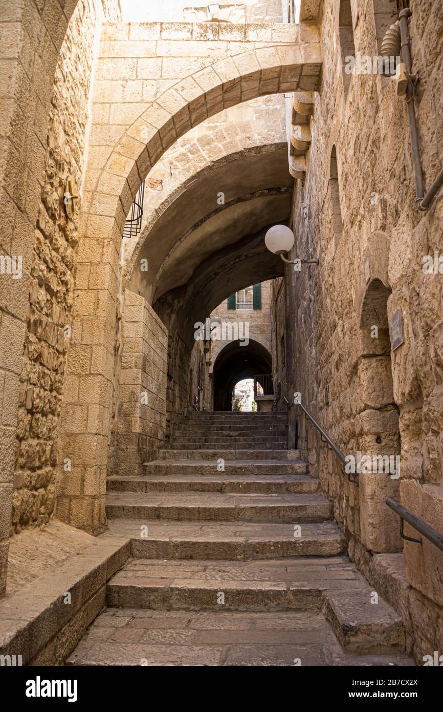 An ancient staircase, in the old Jewish Quarter alleys, arches and old ...