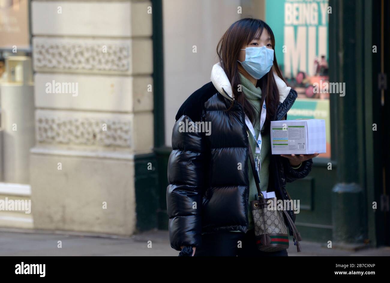 Woman with face mask, Corona Virus scare, Nottingham Stock Photo