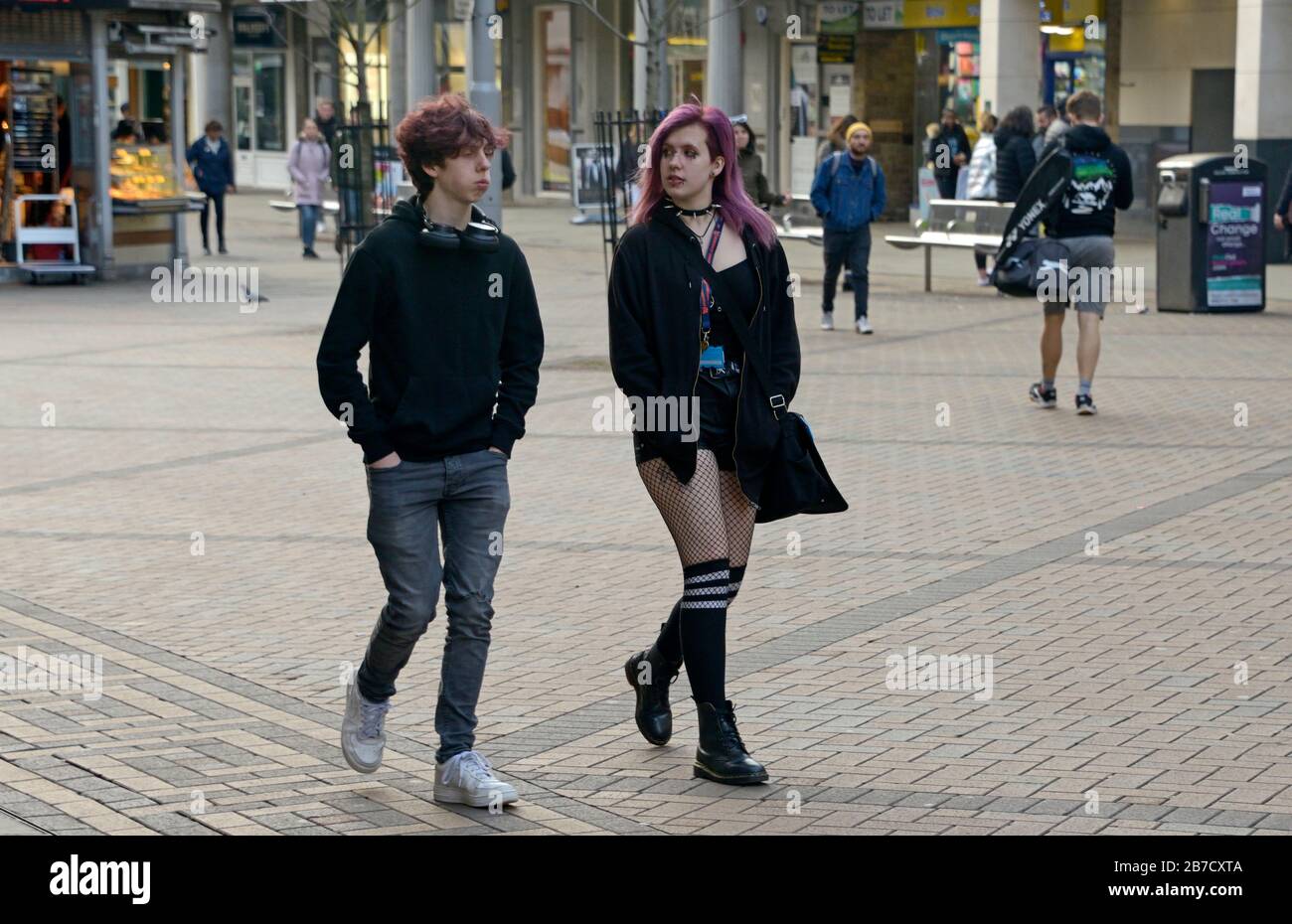 Unusual young couple, in the street, Nottingham. Stock Photo