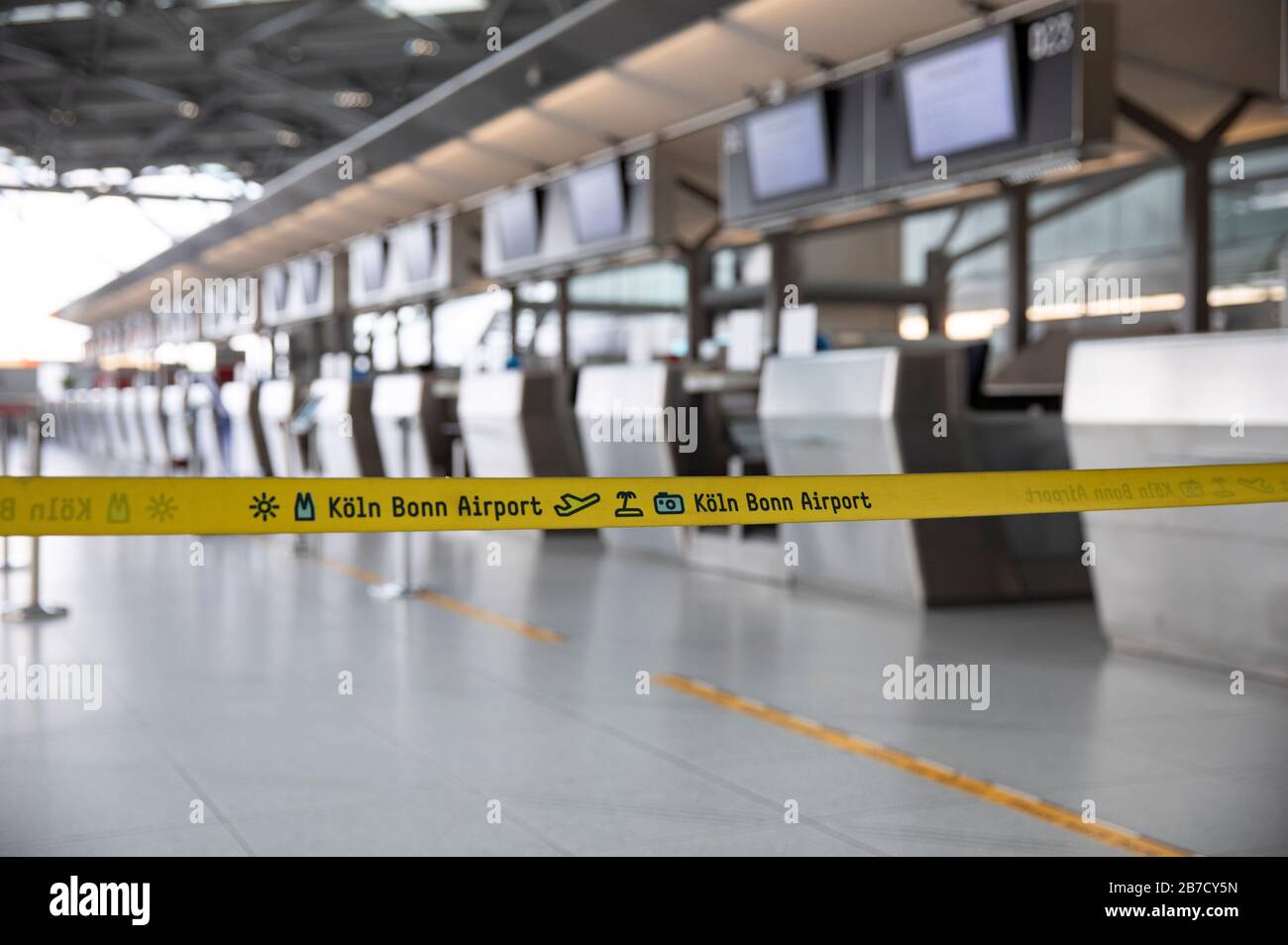 Empty check-in area at Cologne/Bonn Airport. Passenger decline related to the global spread of the corona virus Credit: Geisler-Fotopress GmbH/Alamy Live News Stock Photo