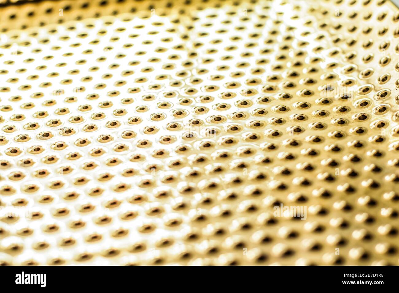 Texture of golden metallic surface as background, materials and ...