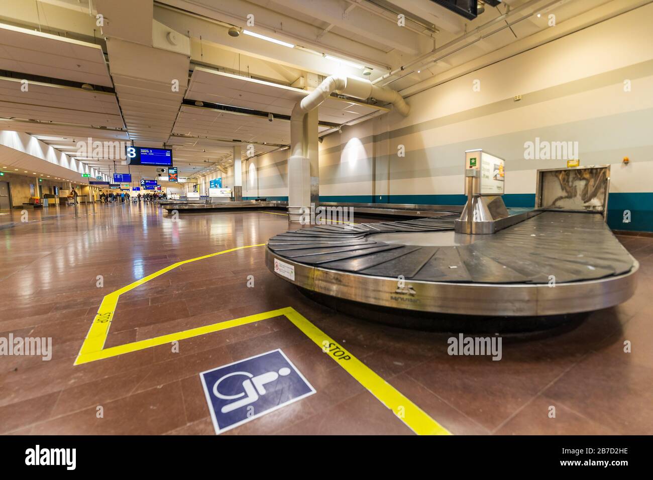 Stockholm, Sweden - March 15th: Deserted arrival zone at Arlanda Airport with empty luggage belt Stock Photo