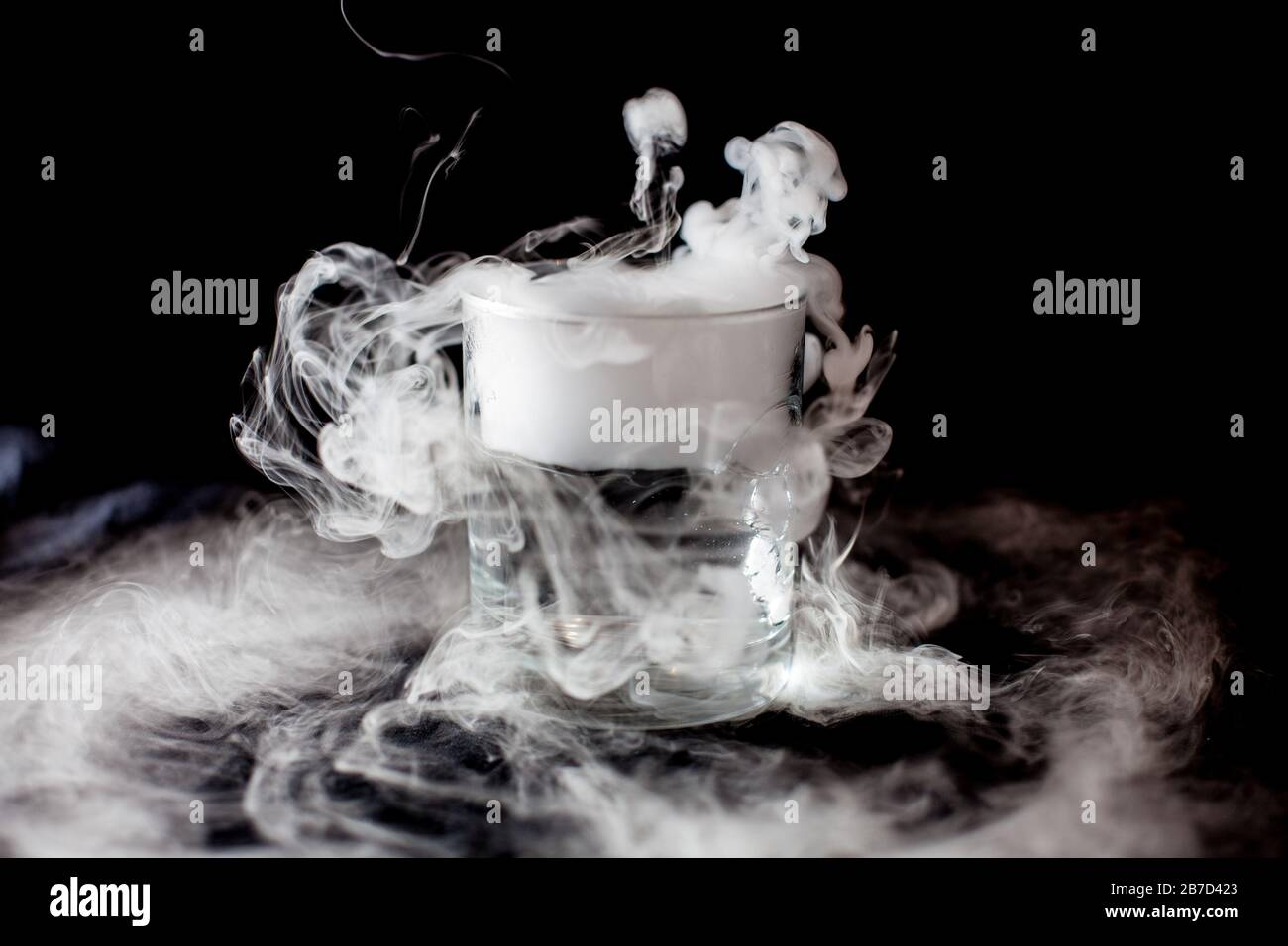 Chemical reaction of dry ice with liquid Stock Photo Alamy