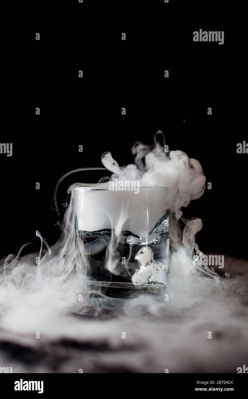 Chemical reaction of dry ice with liquid Stock Photo Alamy