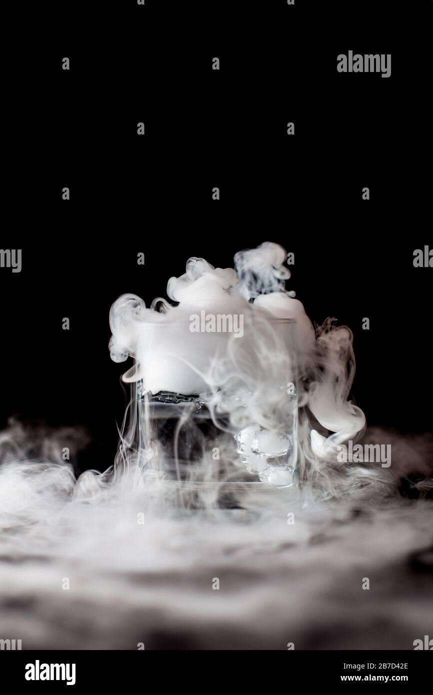 Chemical reaction of dry ice with liquid Stock Photo Alamy
