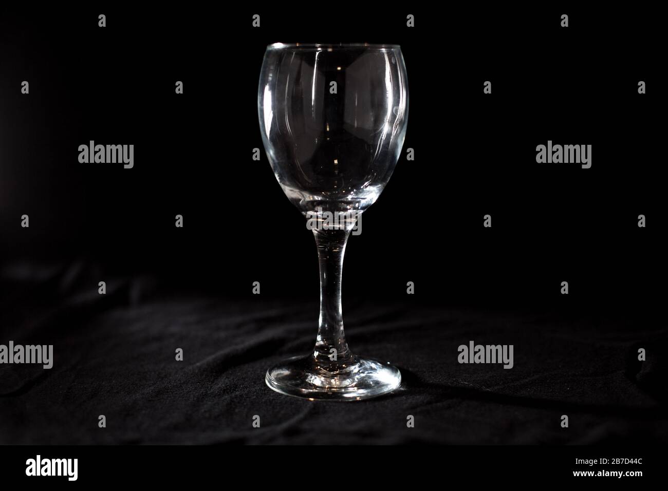 Empty wine glass on black background Stock Photo