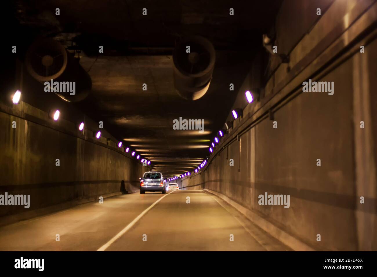 Car in a city tunnel Stock Photo