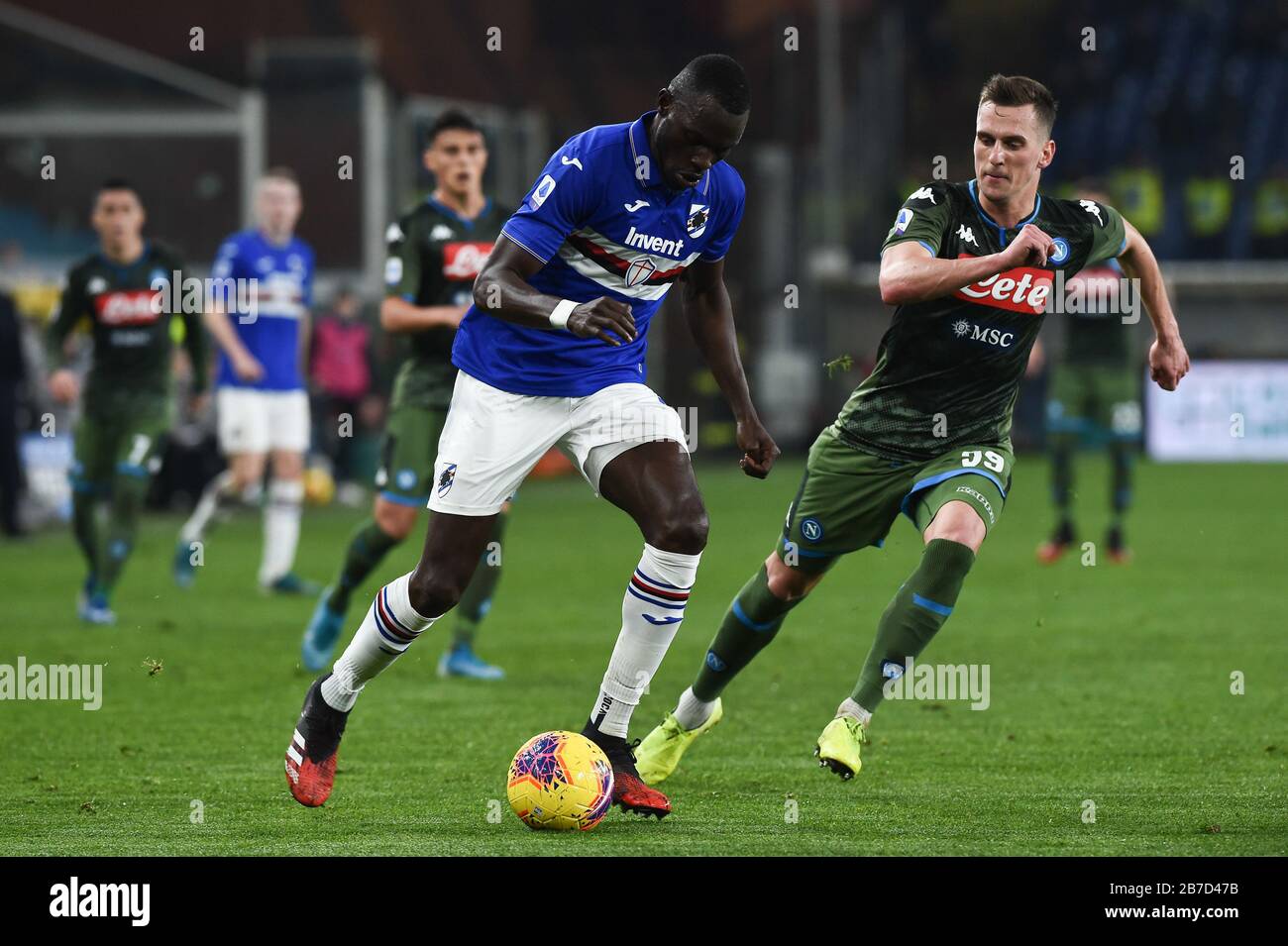 Genova, Italy. 14th Mar, 2020. omar colley (sampdoria), arcadiusz milik (napoli) during Sampdoria Italian Soccer serie A Season 2019/20, italian Serie A soccer match in genova, Italy, March 14 2020 Credit: Independent Photo Agency/Alamy Live News Stock Photo