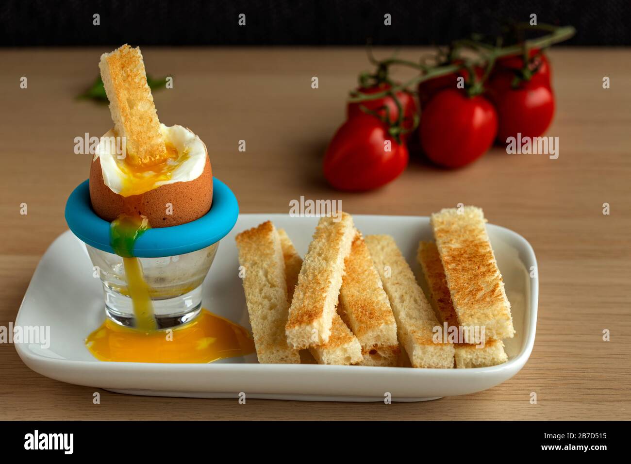 Brakfast food - boiled egg with toast on plate Stock Photo