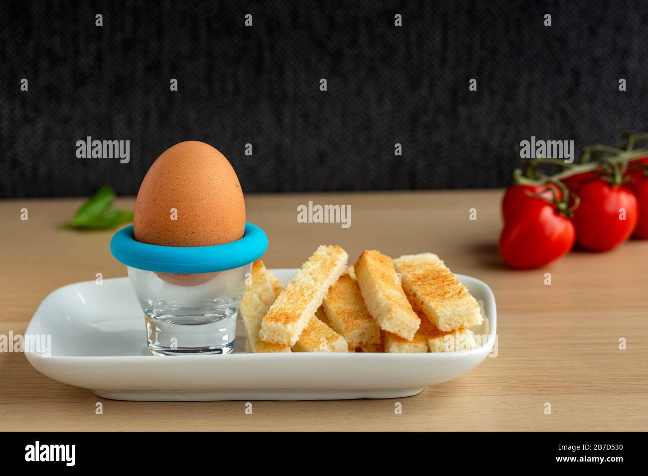Brakfast food - boiled egg with toast on plate Stock Photo