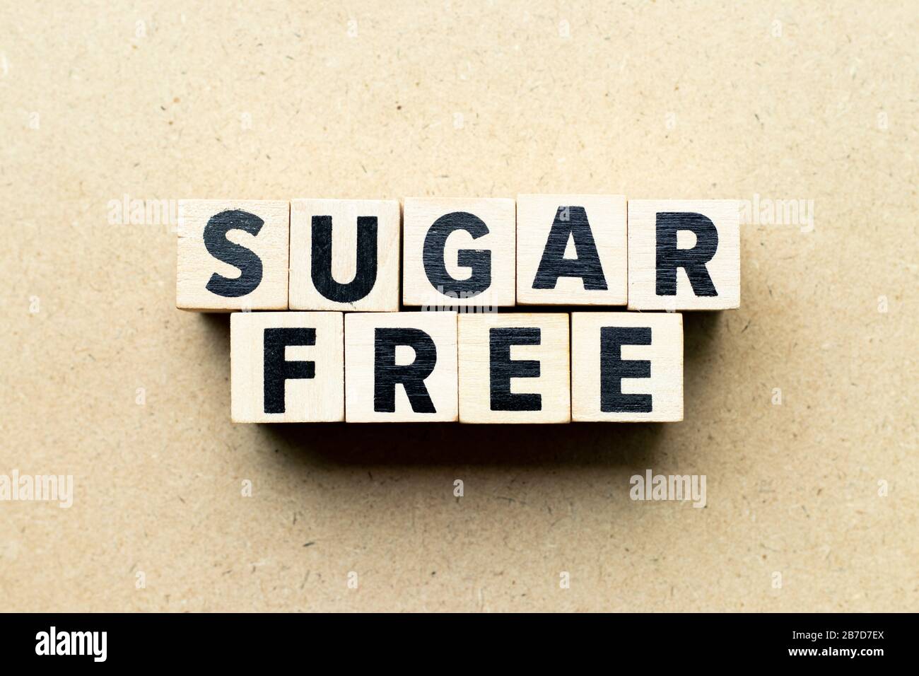 Letter block in word sugar free on wood background Stock Photo