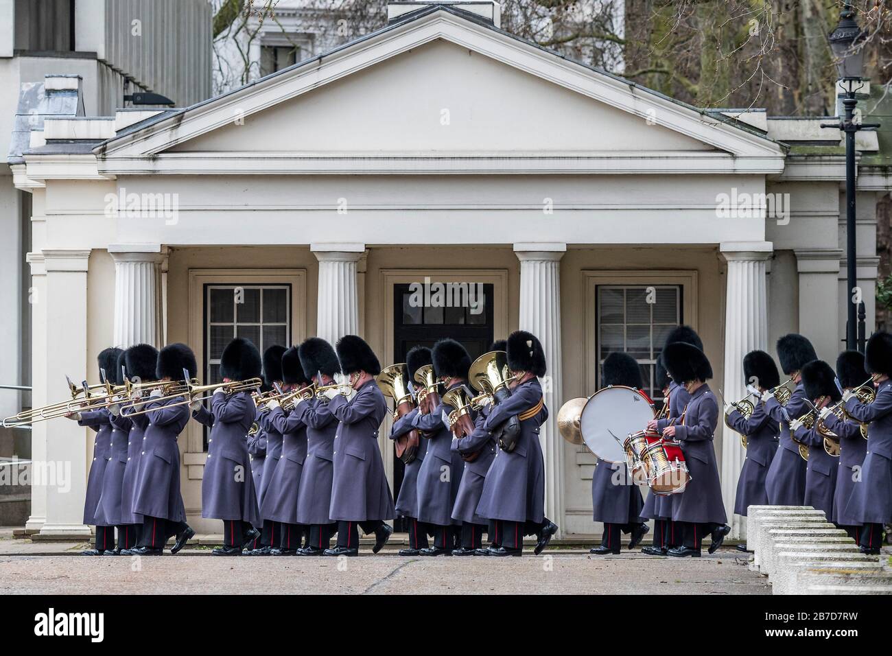London, UK. 15th Mar, 2020. The Coldstream Guards return to barracks after changing the Guard at Buckingham Palace before the Irish Guards annual St Patricks' Day Parade at Wellington Barracks, London. Credit: Guy Bell/Alamy Live News Stock Photo