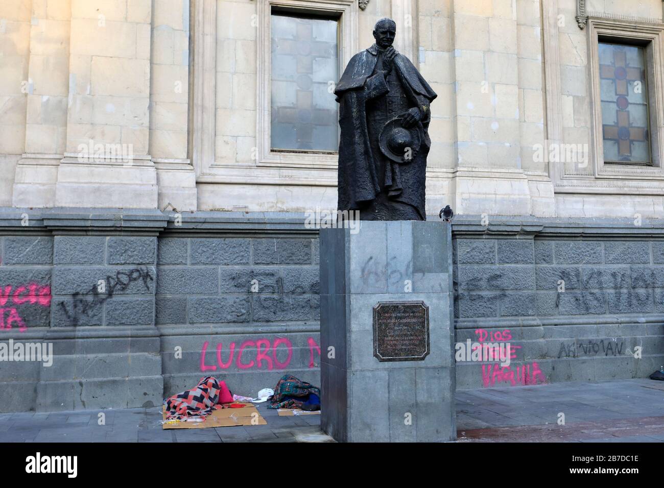 Graffiti on the Statue of Cardinal Jose Maria Caro Rodriguez, Santiago Metropolitan Cathedral, Plaza de Armas square, Region Metropolitana, Santiago C Stock Photo