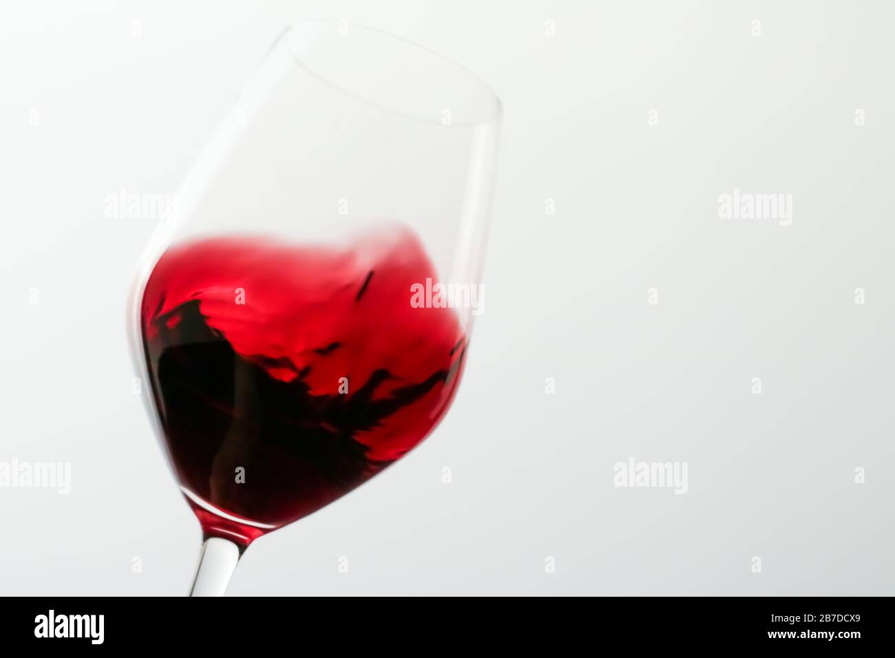 Glass of red wine at tasting event, quality control and alcoholic