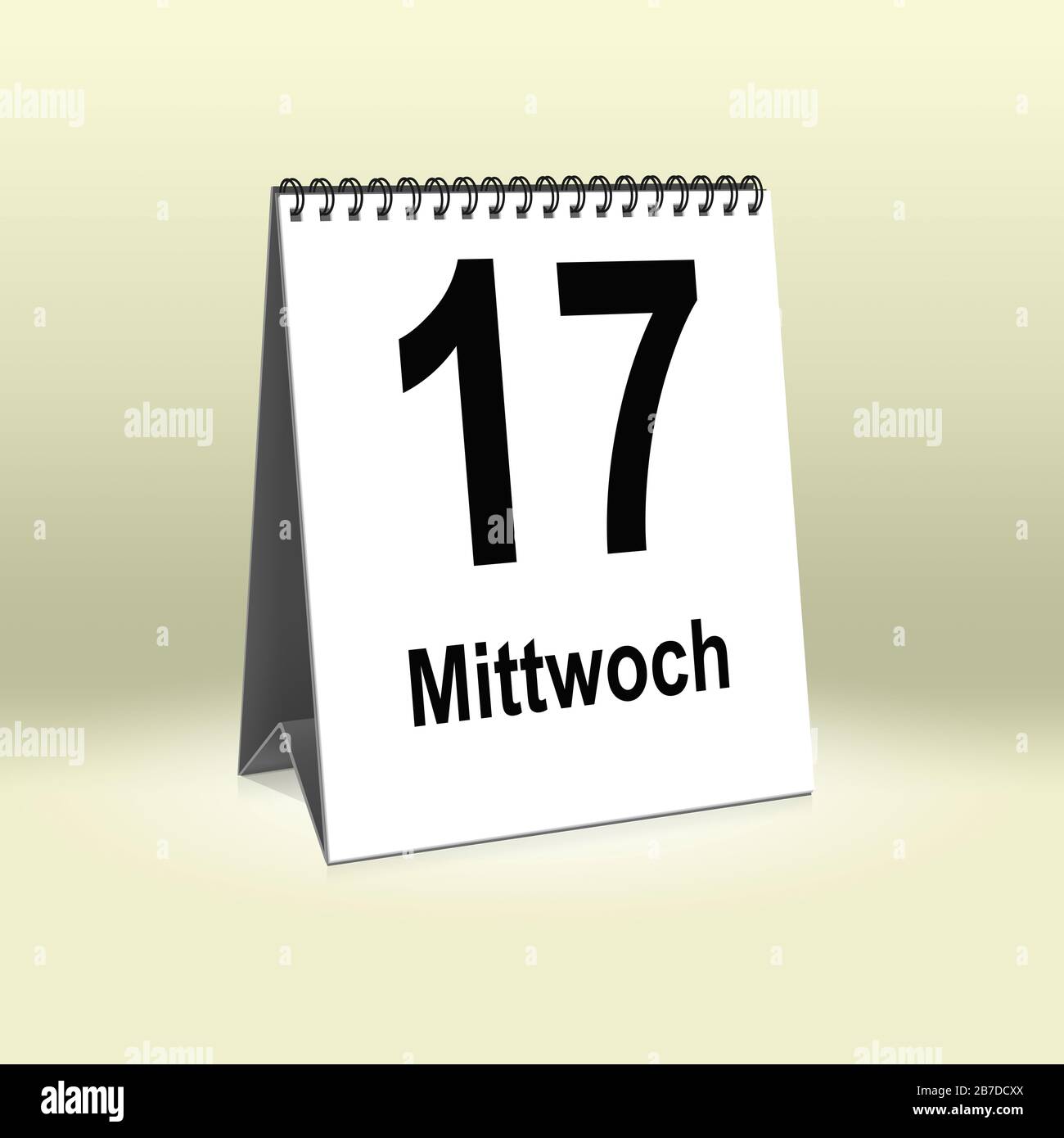A calendar in German language shows Wednesday 17th | Ein Kalender für den Schreibtisch zeigt Mittwoch 17. Stock Photo
