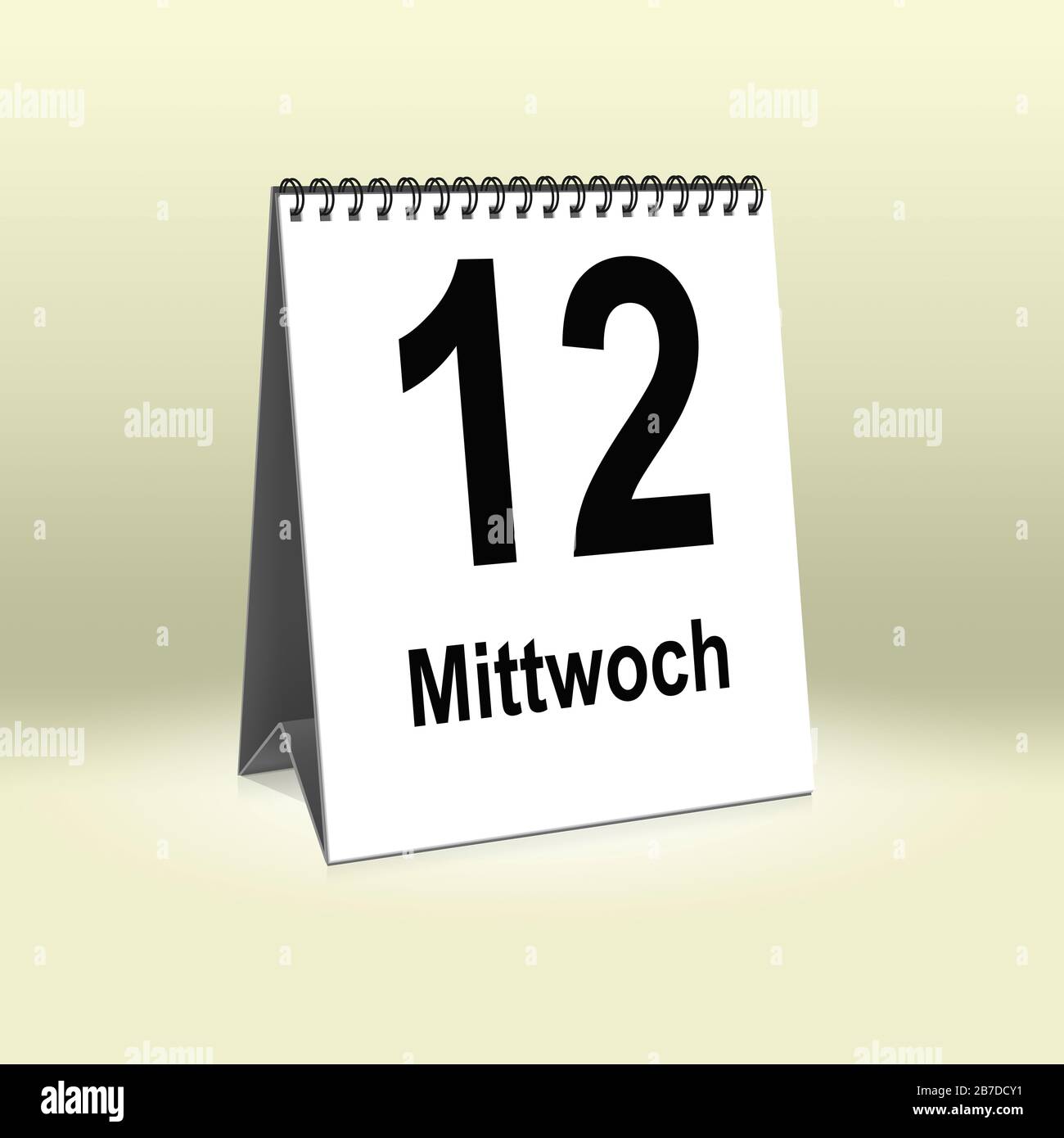 A calendar in German language shows Wednesday 12th | Ein Kalender für den Schreibtisch zeigt Mittwoch 12. Stock Photo