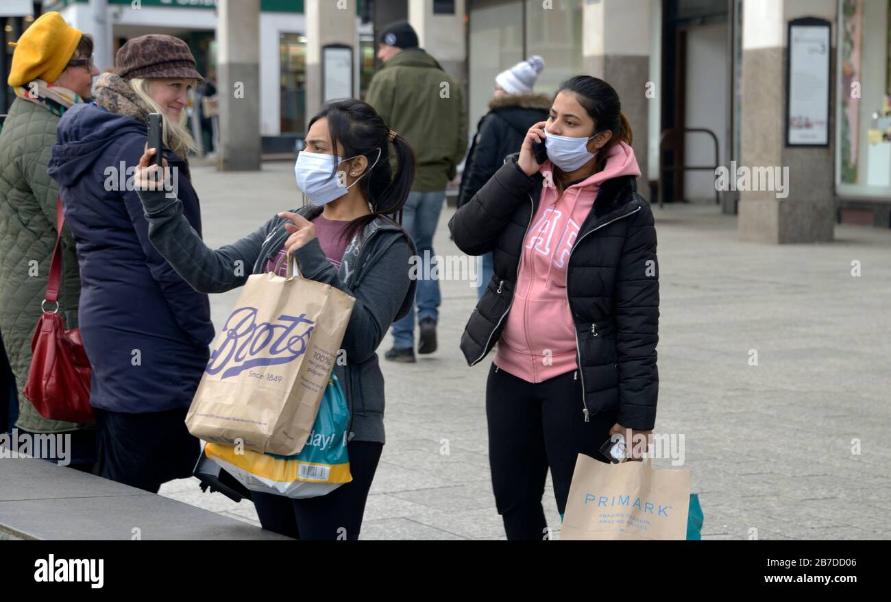 Two young women with face masks hi-res stock photography and images - Alamy