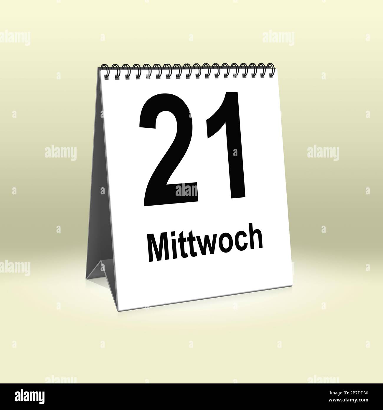 A calendar in German language shows Wednesday 21th | Ein Kalender für den Schreibtisch zeigt Mittwoch 21. Stock Photo