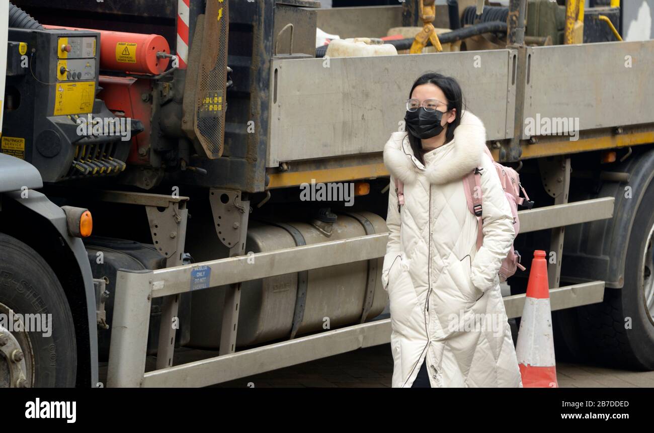Woman with face mask, Corona Virus scare, Nottingham Stock Photo