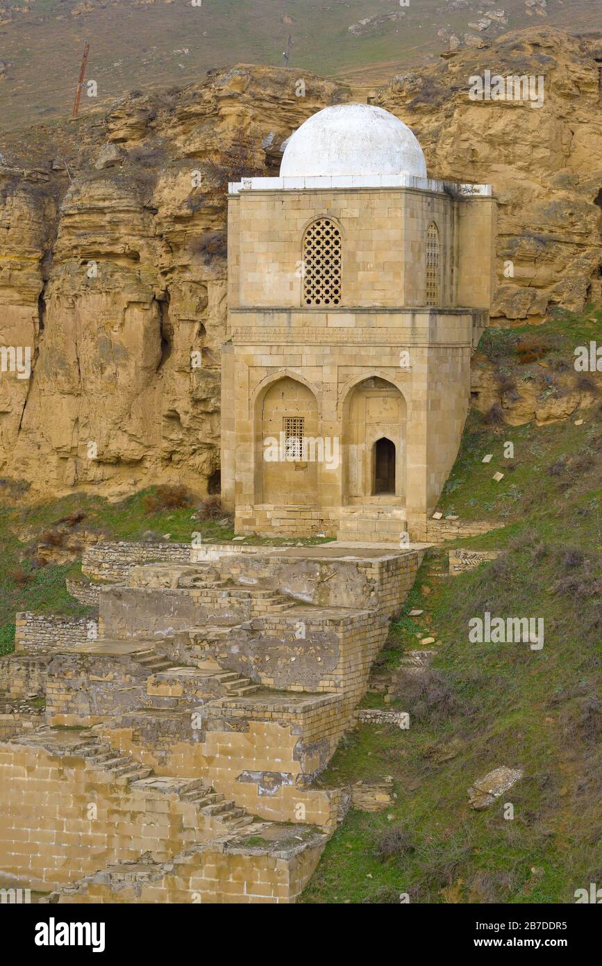 The medieval mausoleum of Sheikh Diri Baba on a January evening. Maraza, Azerbaijan Stock Photo