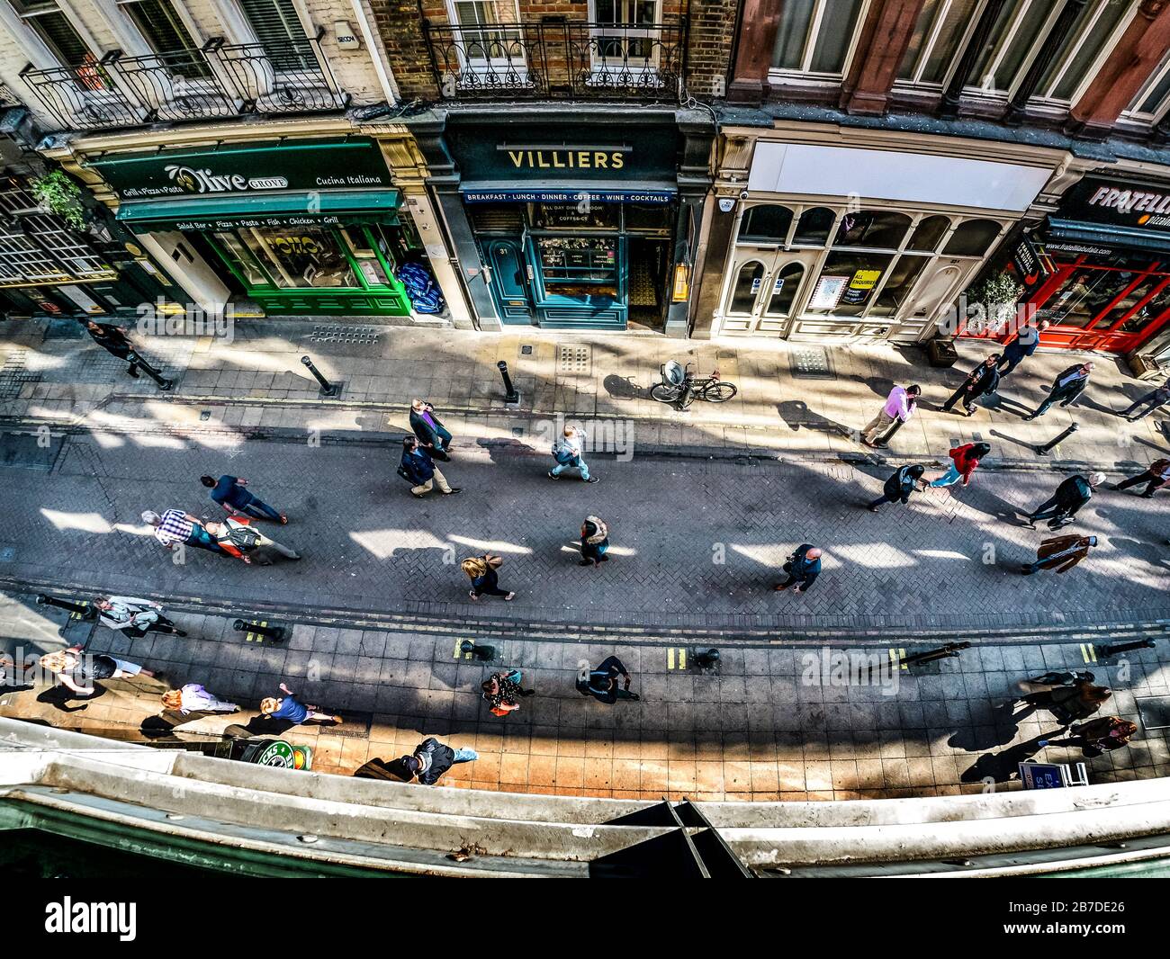 Street photography taken with a wide angle Lens, Craven Street, London Stock Photo