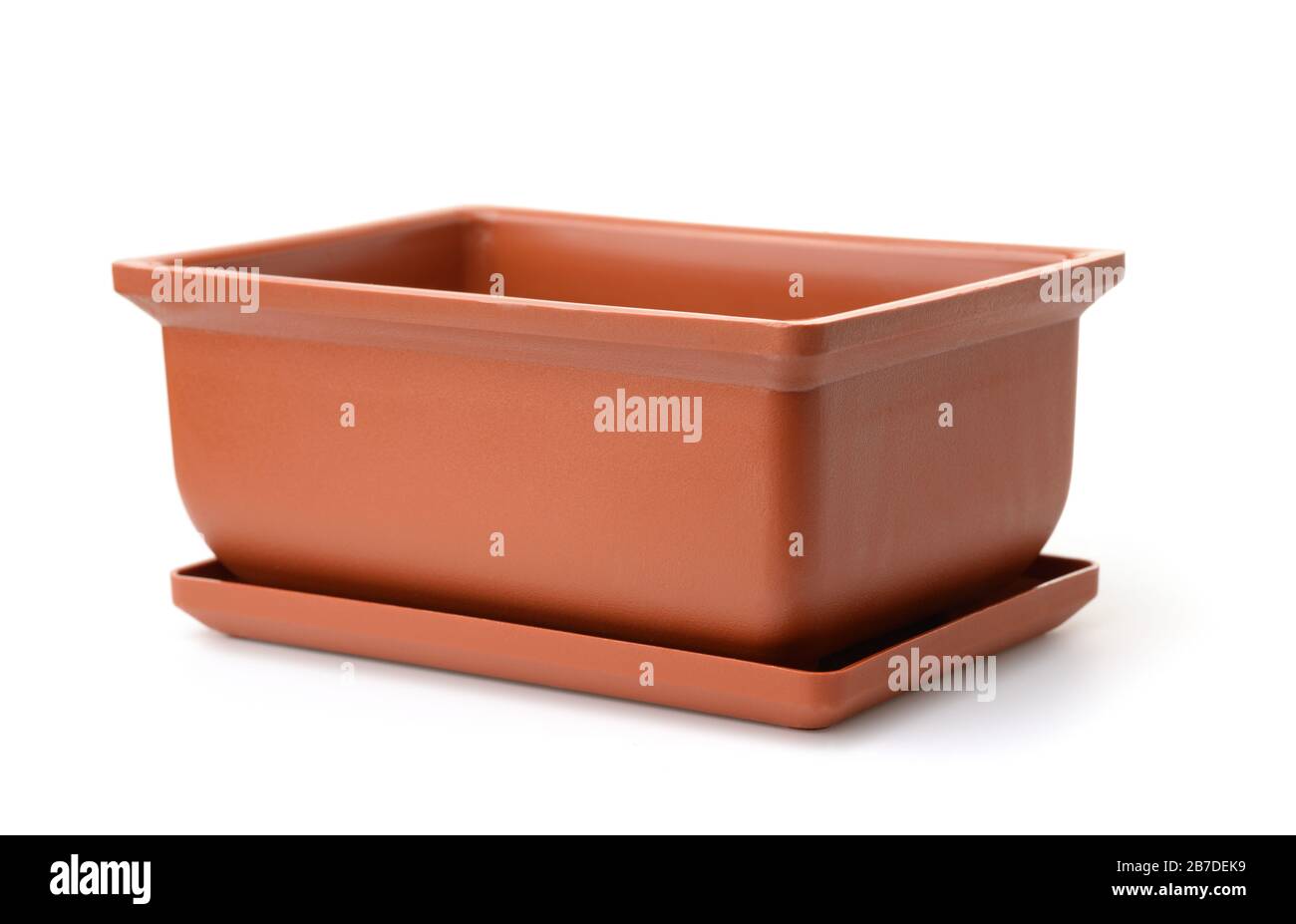 Brown empty rectangular plastic flower pot isolated on white Stock Photo