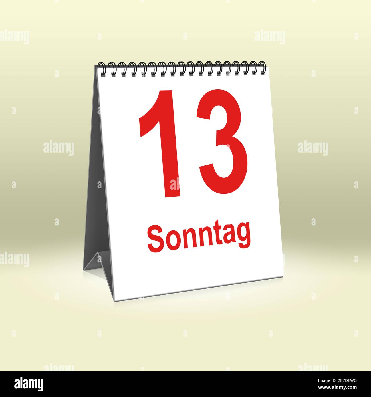 A calendar in German language shows Sunday 13th | Ein Kalender für den Schreibtisch zeigt Sonntag 13. Stock Photo
