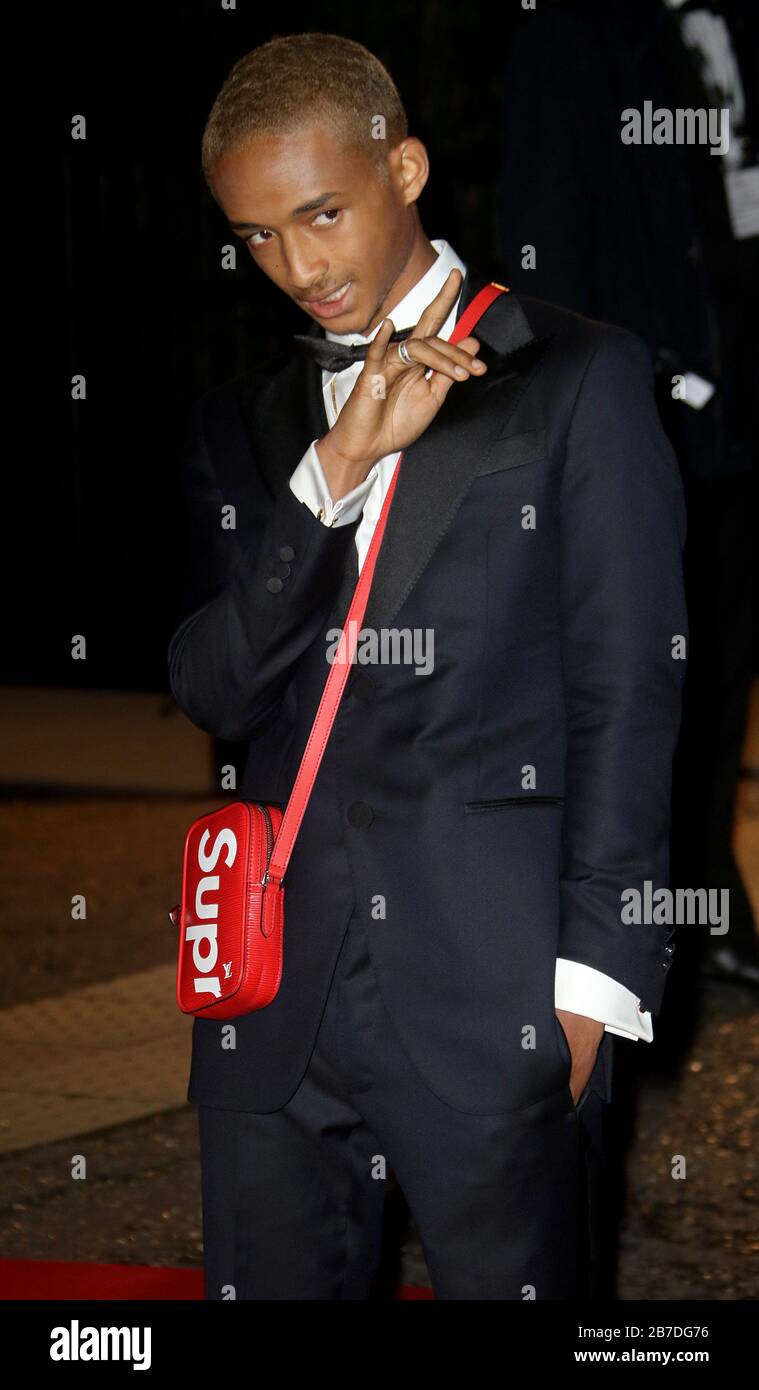 Jaden Smith in suit and street brand supreme (crossbody bag