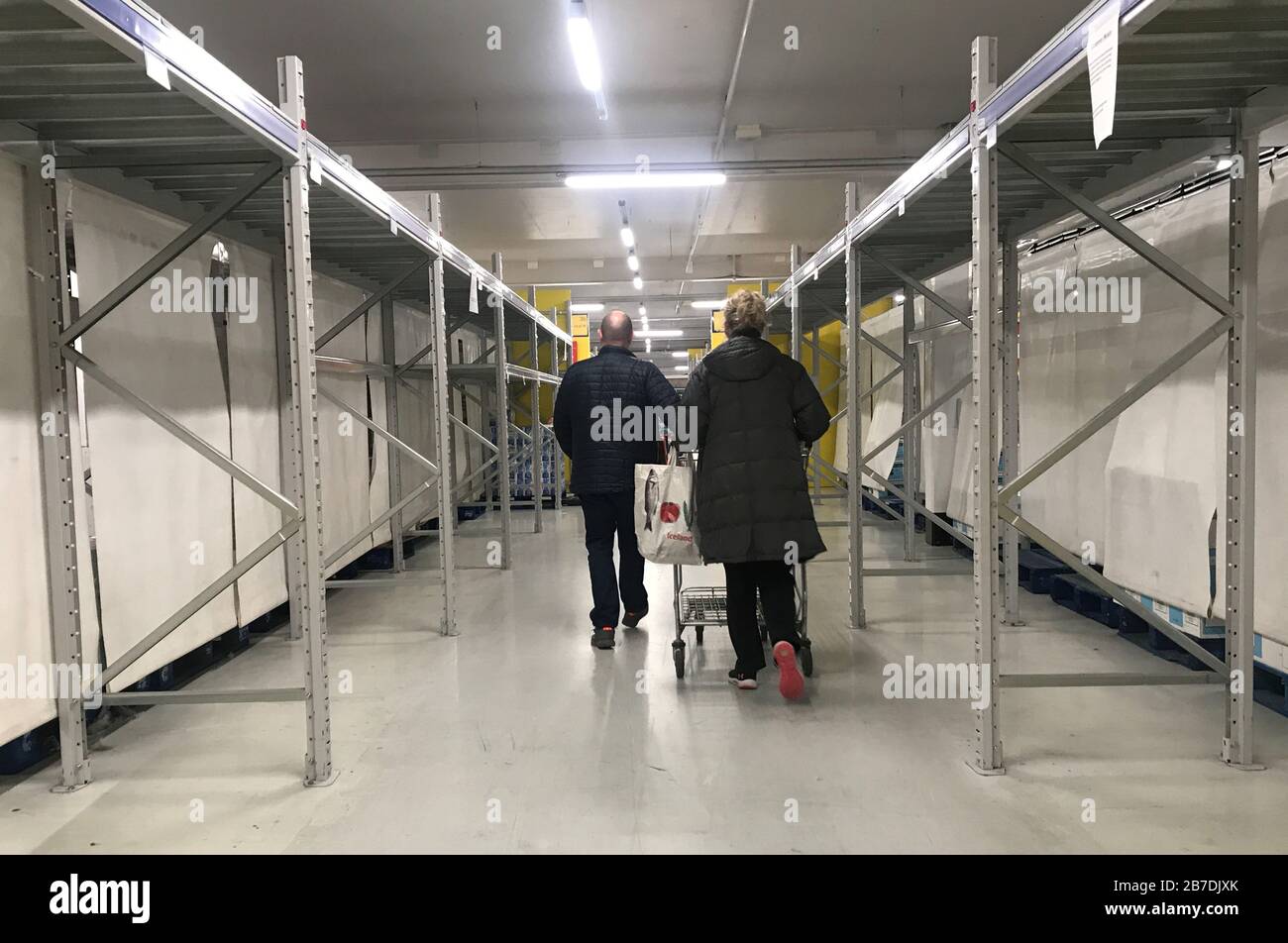 Shelves empty at a Makro in Belfast, as shoppers purchase supplies amid the coronavirus pandemic. Stock Photo