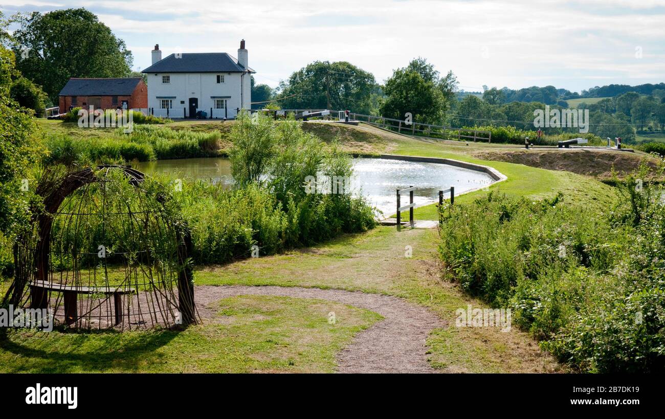 The top lock cottage and locks on the Foxton Flight of the Grand Union