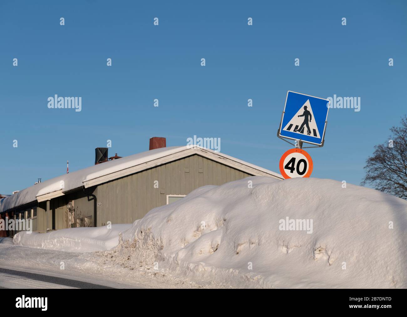 Road sign in winter, Tromso, Norway. Stock Photo